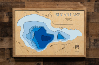 A magnificently detailed, laser-cut, multi-layered wooden topographical map of Sugar Lake (Siseebakwet) in Aitkin County, Minnesota, showcasing the pristine 416-acre glacial lake with breathtaking 26-foot water clarity and Caribbean-aquamarine colors created by calcium carbonate. The natural wood top layer frames approximately four miles of shoreline including Sugar Lake Lodge, Sugarcrest resort, the connection to Little Sugar Lake, and Big Thunder Peak views, while graduated blue layers create a stunning v