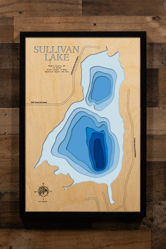 A precision laser-cut, multi-layered wooden map of Sullivan Lake in Wright County, Minnesota, nestled between Buffalo and Maple Lake. The natural wood top layer captures the shoreline of this small, highly developed lake in fine detail, while a light-to-dark blue gradient highlights its surprising 58-foot depth. A handcrafted statement piece for any Minnesota lake home, cabin, or outdoor enthusiast's wall.