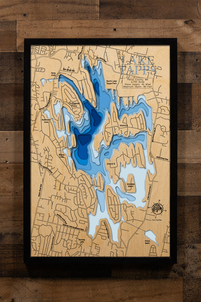 A meticulously crafted, multi-layered wooden topographic map of Lake Tapps in Pierce County, Washington, featuring laser-cut depth contours revealing the reservoir's 90-foot maximum depth, the intricate 45-mile shoreline with its distinctive islands and peninsulas, location markers for North Lake Tapps Park and Allan Yorke Park boat launches, and Mount Rainier's profile visible to the south.
