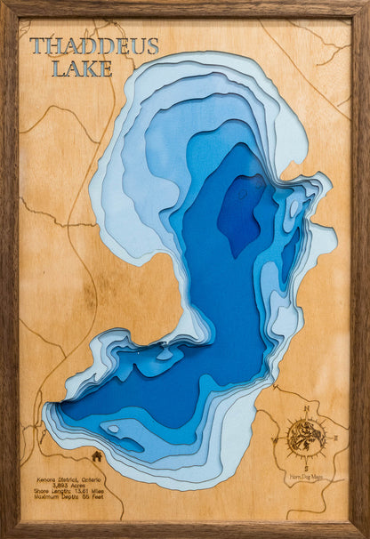 Decorative 3D wooden lake map of Thaddeus Lake in Kenora District, Ontario Canada, crafted with care.