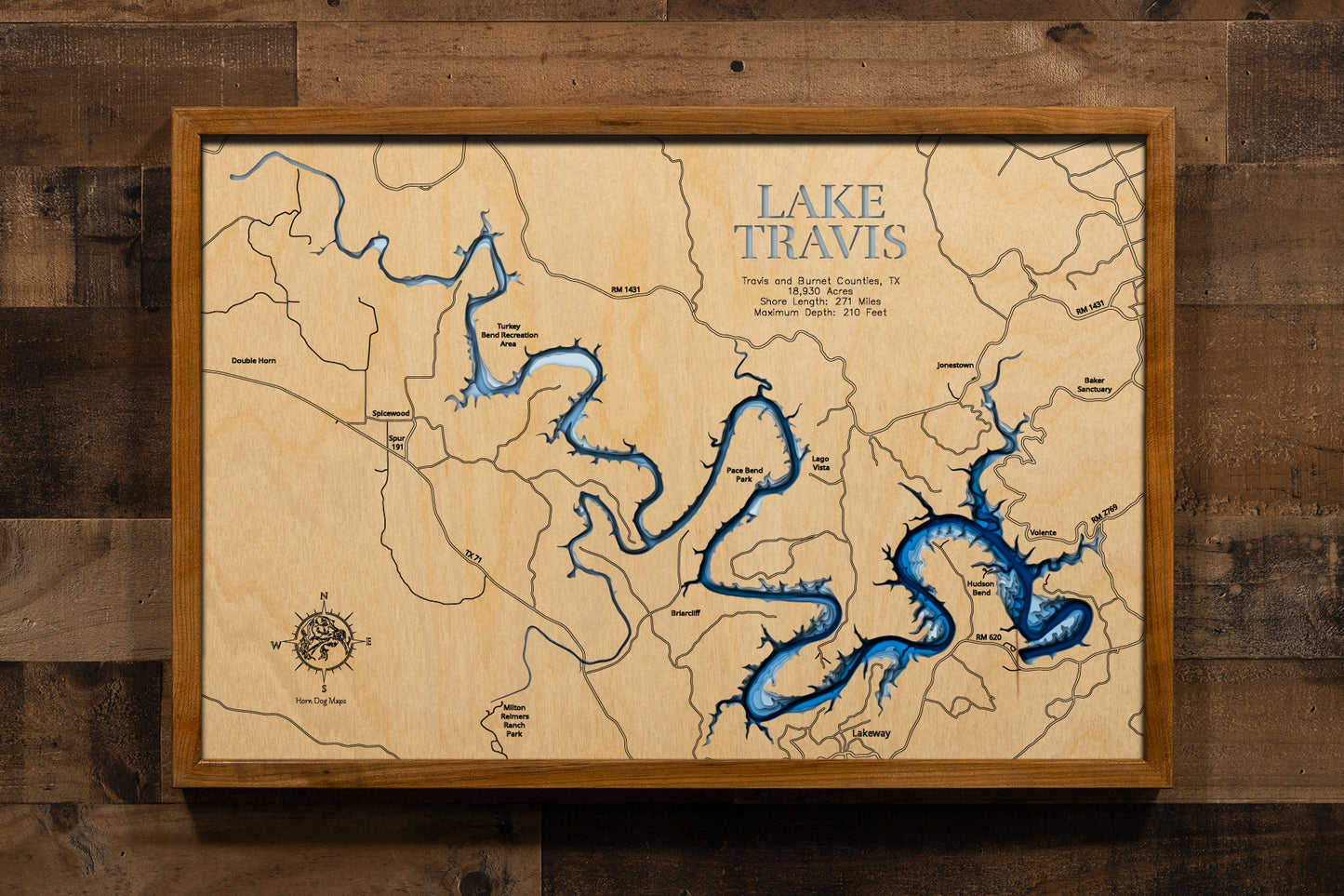 A stunning multi-layered, laser-cut wooden topographic map of Lake Travis in Travis and Burnet Counties, Texas, showcasing the reservoir's dramatic 65-mile serpentine course through limestone cliffs, detailed depth contours illustrating the impressive 210-foot maximum depth near Mansfield Dam, the intricate 271-mile shoreline with distinctive coves and inlets, and markers for major access points and communities along the Texas Hill Country waterway.