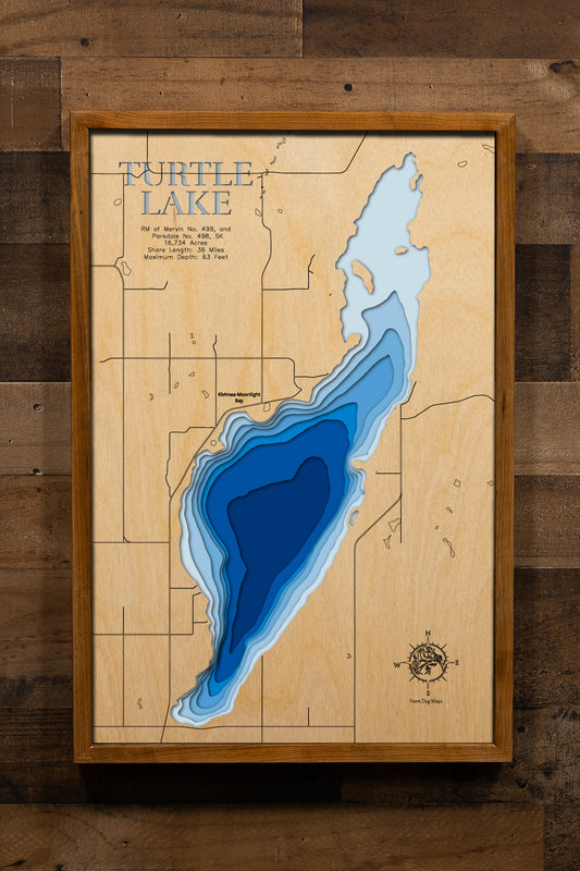 A high-quality 3D laser-cut wooden map of Turtle Lake in 
Saskatchewan, Canada. The map features a natural wood top layer 
contrasted with recessed water layers stained in a light-to-dark 
blue gradient, showcasing the 36-mile shoreline and 63-foot maximum 
depth. This elegant topographic art piece highlights the unique 
contours of the reservoir and its many resort hamlets, making it a 
perfect commemorative gift or sophisticated decor item for a 
lakeside home or office.