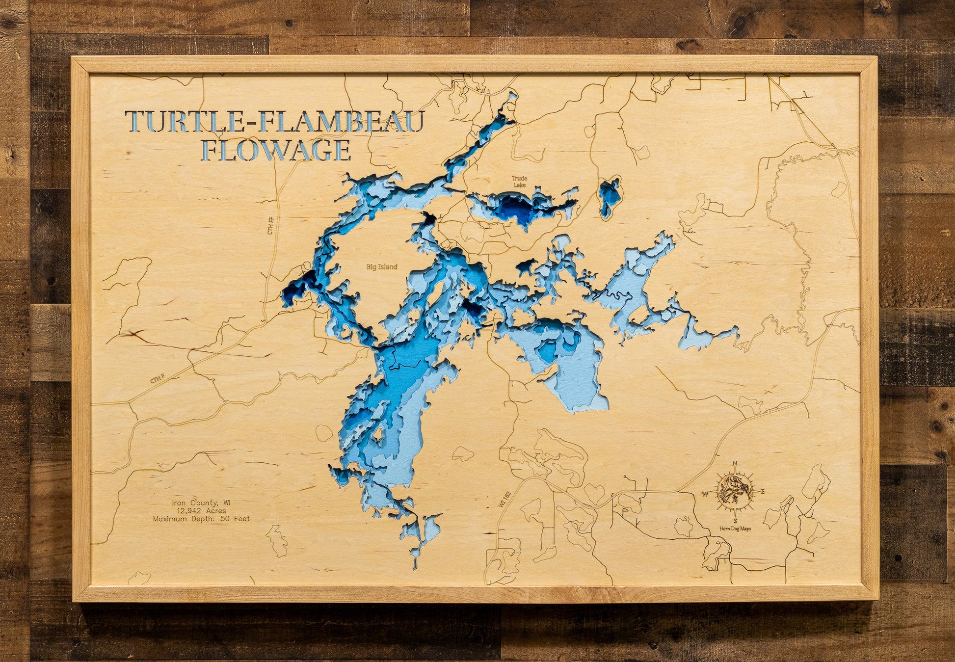 Detailed wooden relief map of Turtle Flambeau Flowage  in Iron County, WI, showcasing its natural beauty.