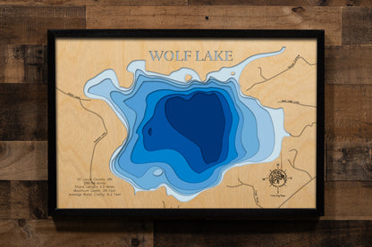 Detailed wooden relief map of Wolf Lake in St. Louis County, MN, showcasing its natural beauty.