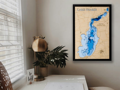 3D Lake Osakis map in a sleek black frame, displayed in a modern setting with contemporary decor elements.