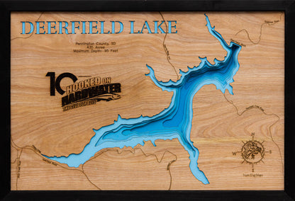 3D wooden lake map of Deerfield Lake in Pennington County, SD, showcasing detailed depth layers and contours.