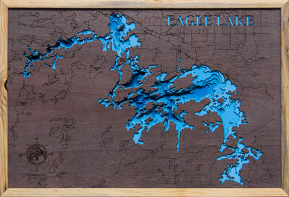 Laser-engraved relief map of Eagle Lake in Ontario Canada, crafted from wood with high precision.