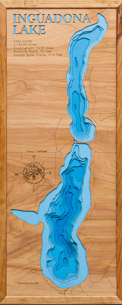 Laser-engraved relief map of Inguadona Lake in Cass County, MN, crafted from wood with high precision.