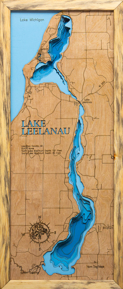 Detailed wooden relief map of Lake Leelanau in Leelanau County, MI, showcasing its natural beauty.