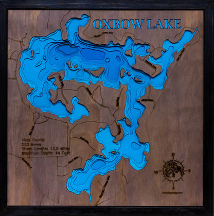 Detailed wooden relief map of Oxbow Lake in Vilas County, WI, showcasing its natural beauty.