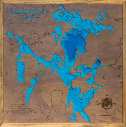 Laser-engraved relief map of Sand Point Lake in St. Louis County MN and Ontario Canada, crafted from wood with high precision.