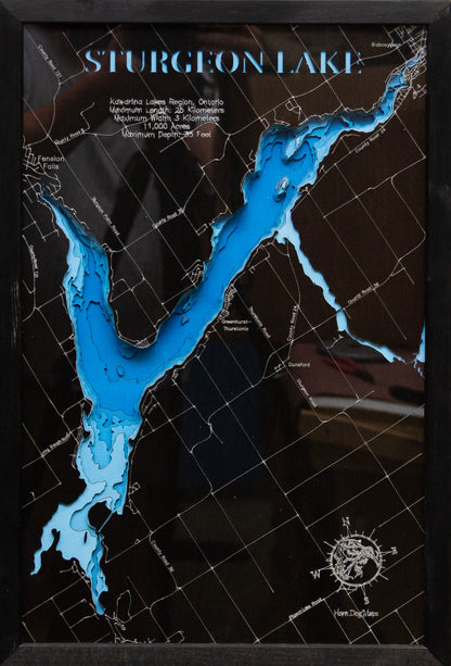 Custom wooden map of Sturgeon Lake in the Kawarthas Region, Ontario with layered depth highlights.