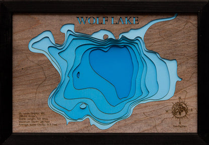 Detailed wooden relief map of Wolf Lake in St. Louis County, MN, showcasing its natural beauty.